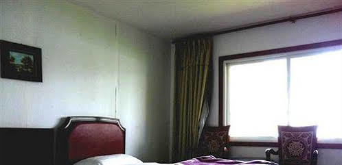 Mount Emei Jindingxiang Huaili Hotel Emeishan Esterno foto